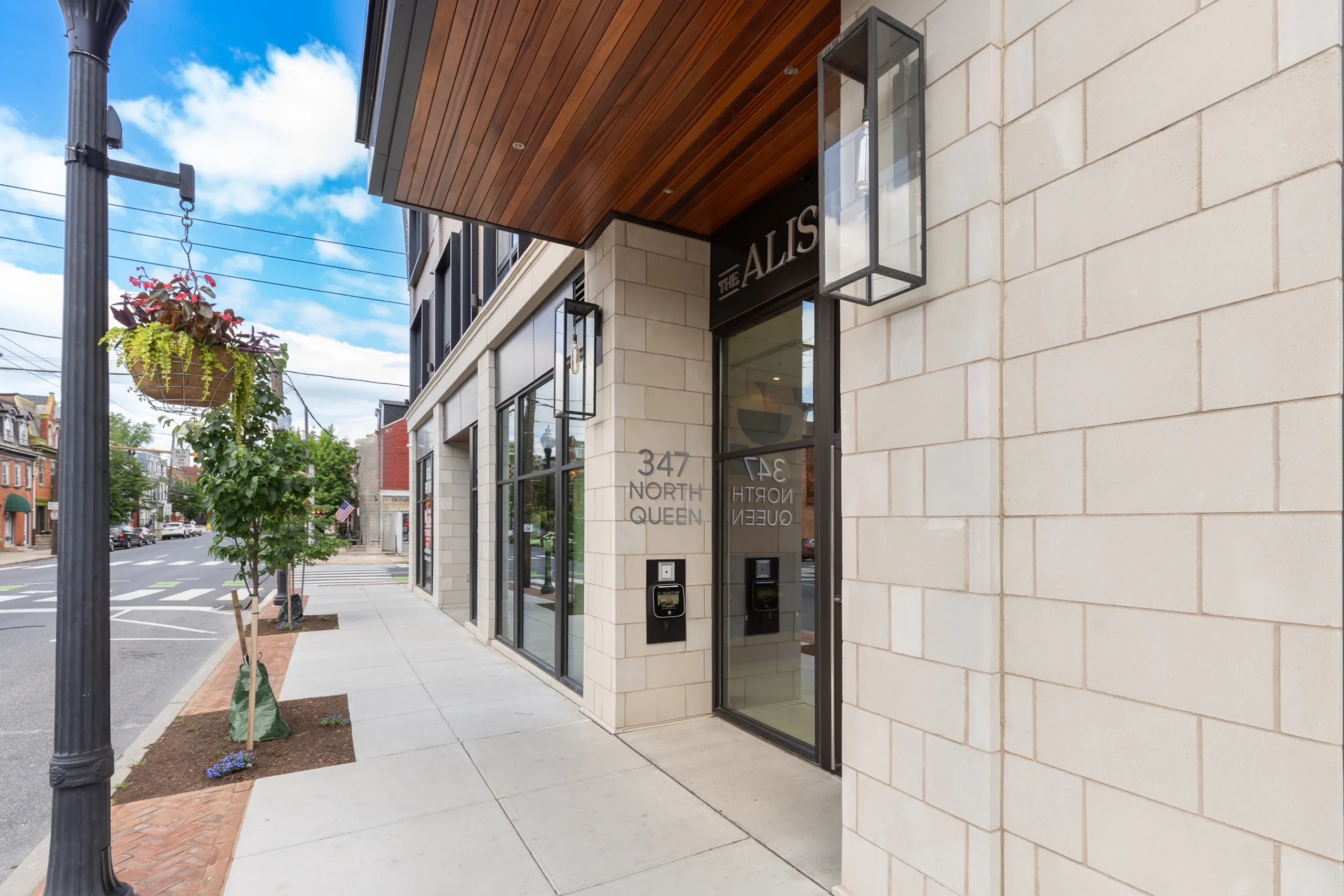 Front entrance of The Alistair Apartments on North Queen Street in Lancaster, PA