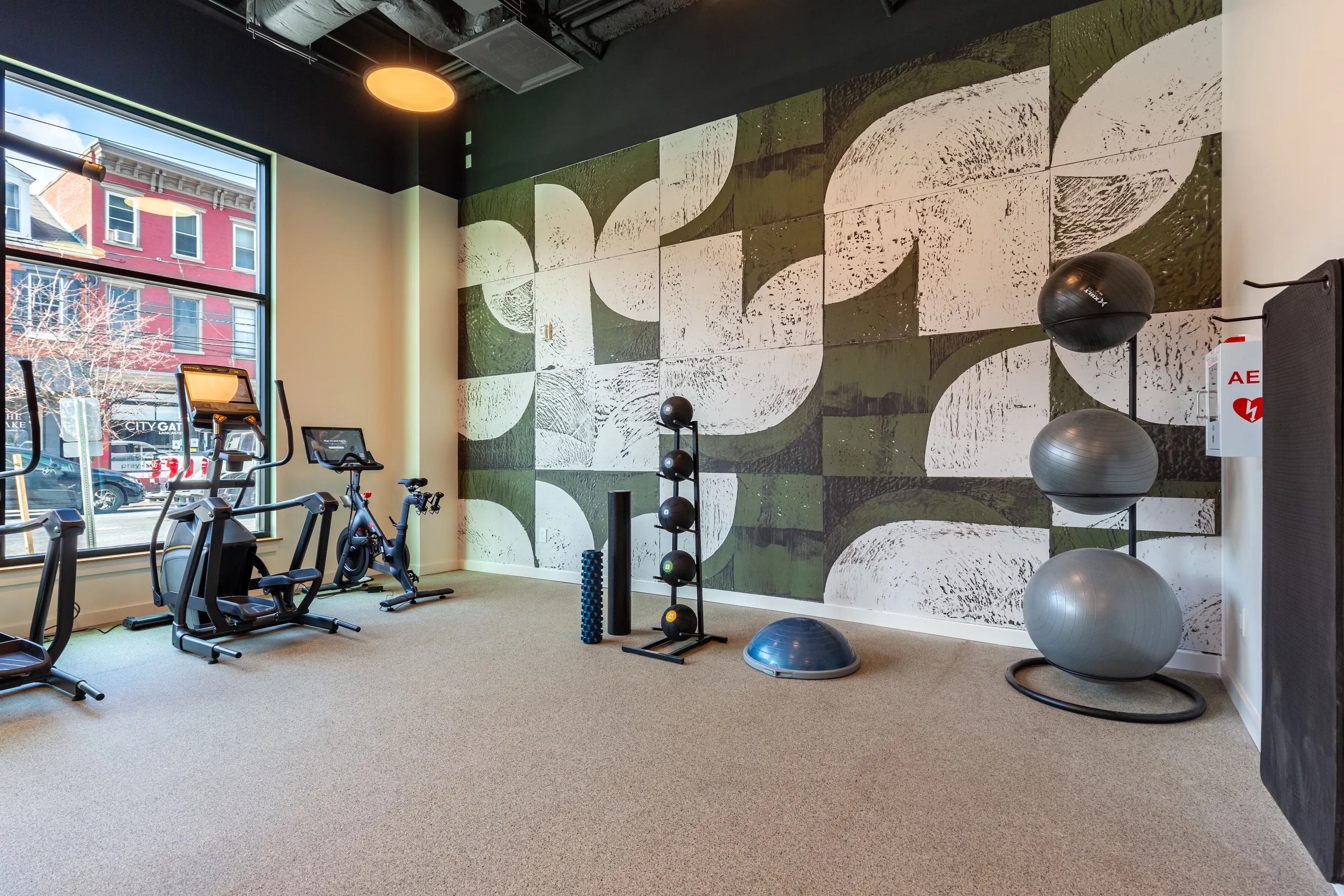 Fitness center with cardio equipment, strength equipment and exercise space