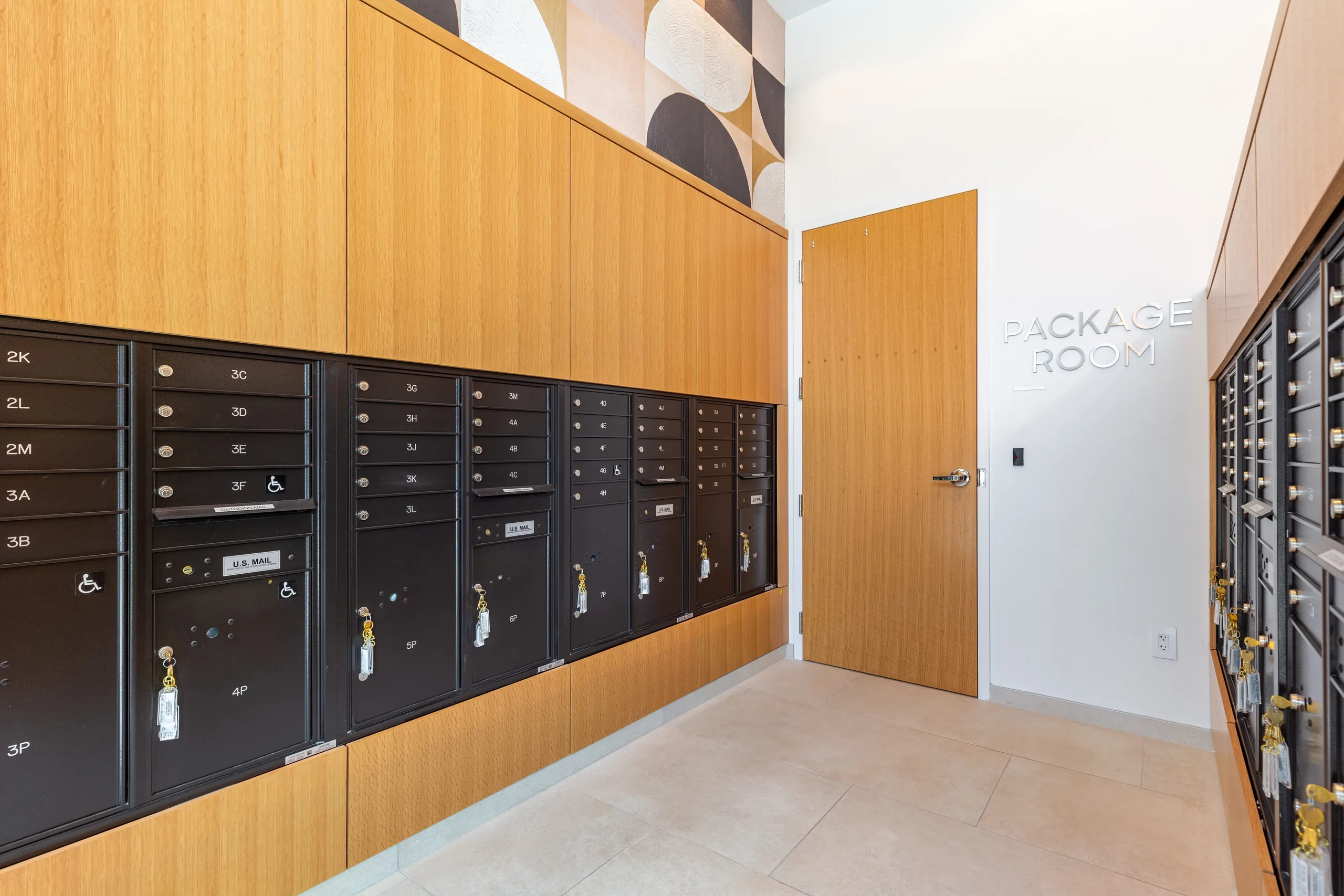 Mail and package room with oak paneling and built-in mailboxes