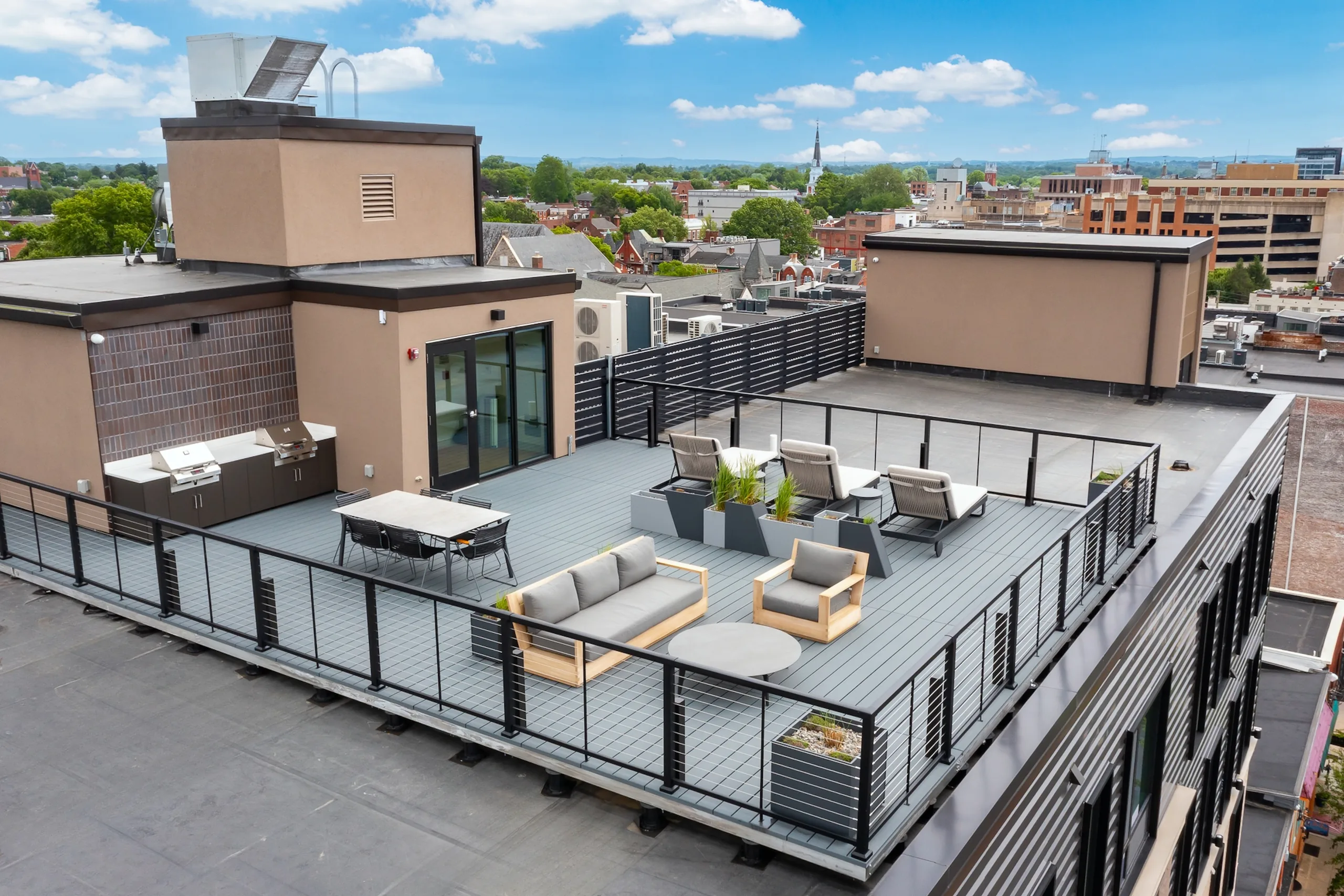 Elevated view of The Alistair rooftop deck and outdoor seating