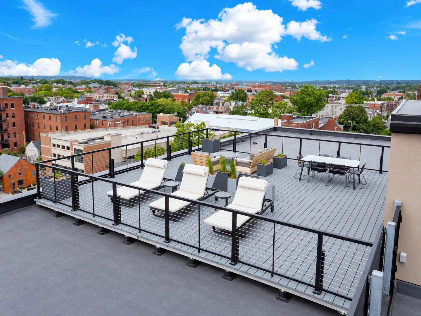 West-facing rooftop deck at The Alistair Apartments overlooking downtown Lancaster